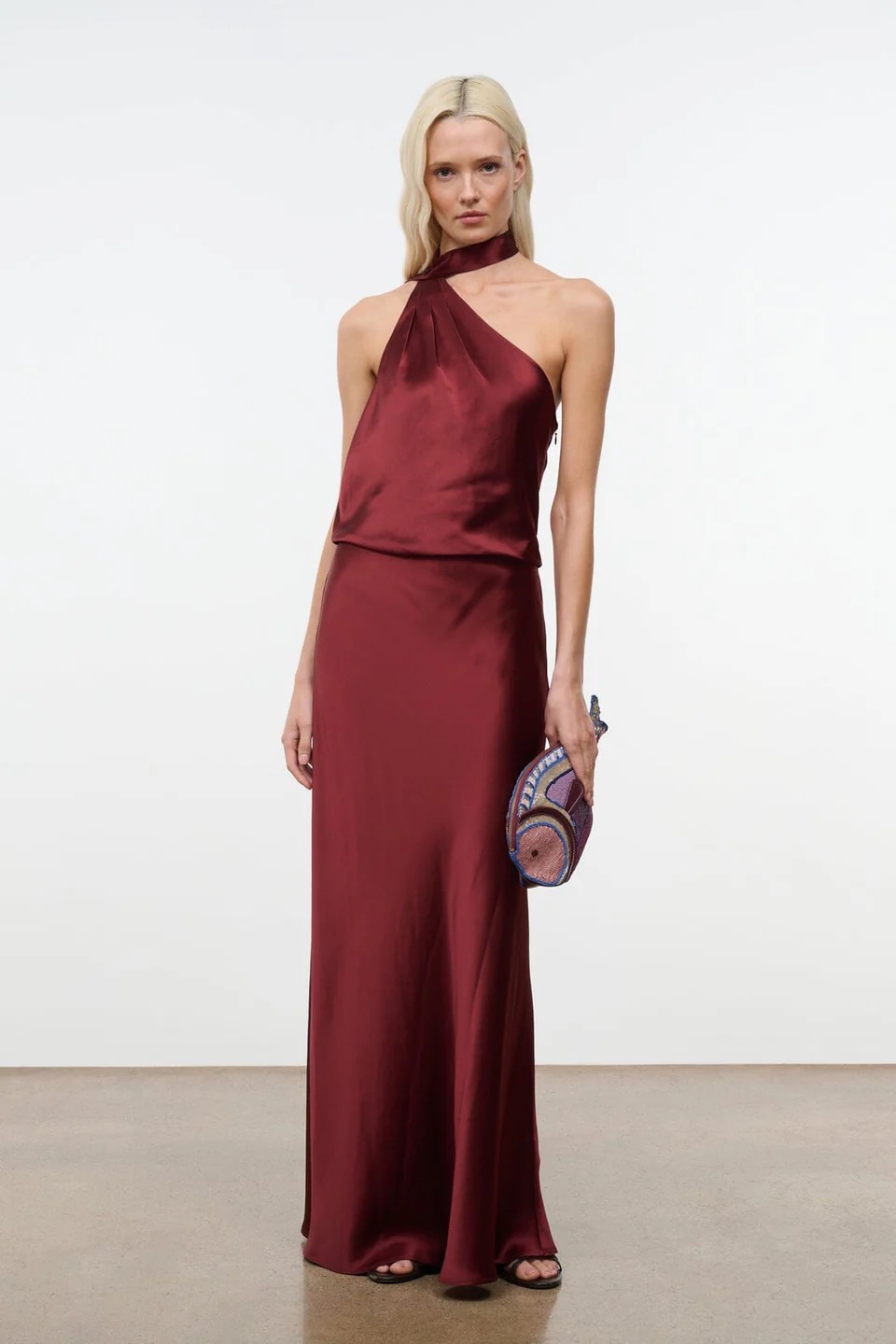 Oxblood satin halter-neck gown