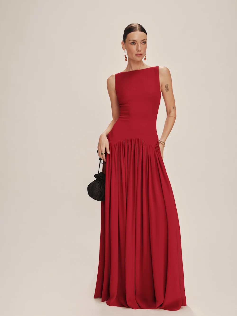 Red crepe gown with gathered skirt